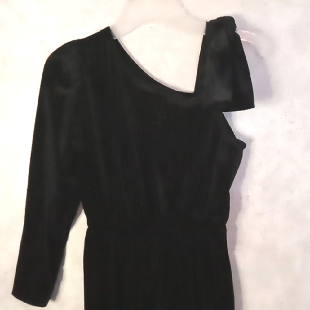 Girls Black Velvet like Jumpsuit with one shoulder bow detail with sparkle